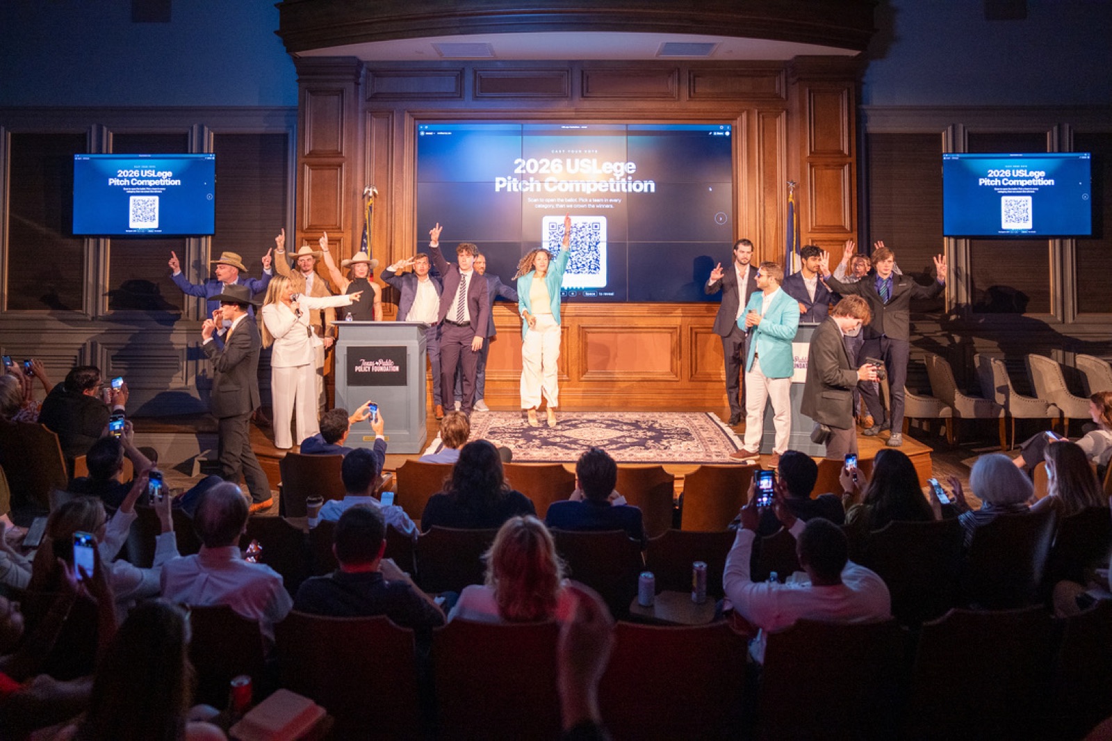 Full stage and audience at the 2026 USLege Pitch Competition